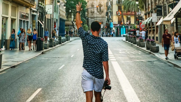 Want to get paid to travel the world? You can - but there's a catch